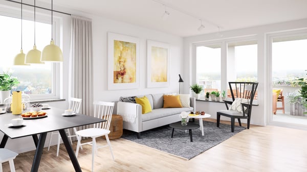Lägenhet med ljust vardagsrum, matplats och balkongdörrar i modern öppen planlösning